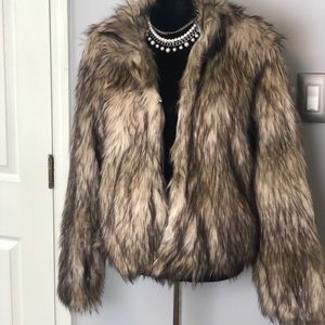 Faux-fur coat just in time for those holiday parties.😊